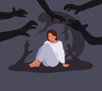 Woman hunching over
